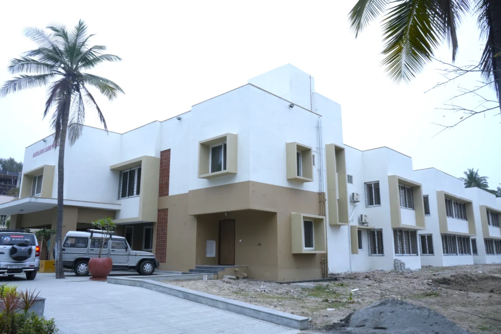 Modern exterior cladding with natural stone, HPL panels, and wooden finish.