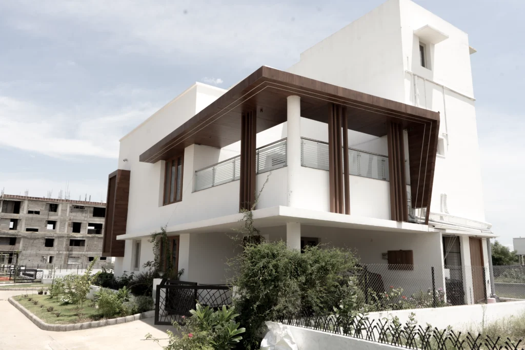 Luxury villa exterior with landscaped garden, modern façade, and premium architectural design.